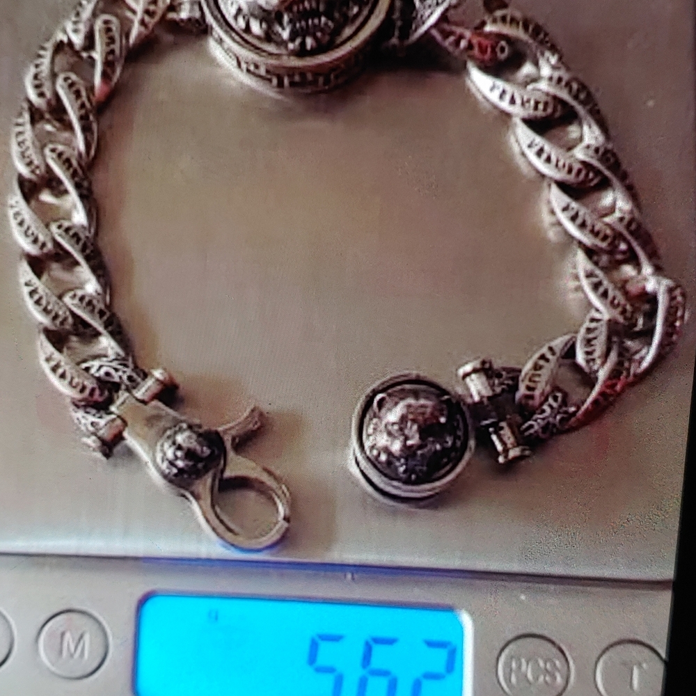 Sterling Silver Finished Lion Link Bracelet 56.2 Grams. Size: 22